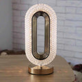 Luminous Loop Crystal Table Lamp – Golden Glow Edition