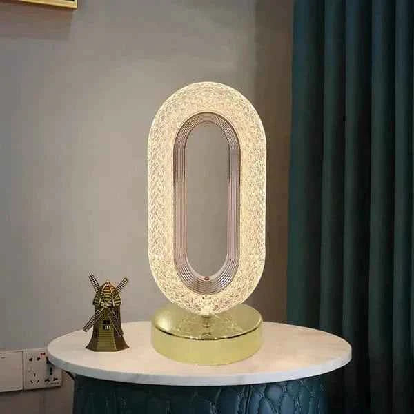 Luminous Loop Crystal Table Lamp – Golden Glow Edition