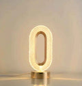 Luminous Loop Crystal Table Lamp – Golden Glow Edition
