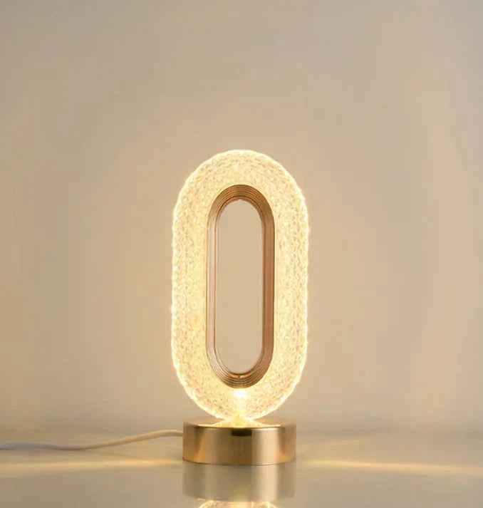 Luminous Loop Crystal Table Lamp – Golden Glow Edition