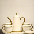 Golden Radiance Revolving Tea Set